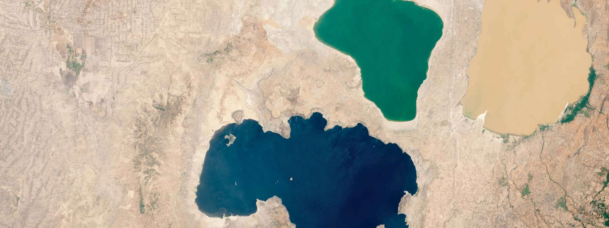 An inland sea once connected the lakes, but they now have different appearances and water chemistries.