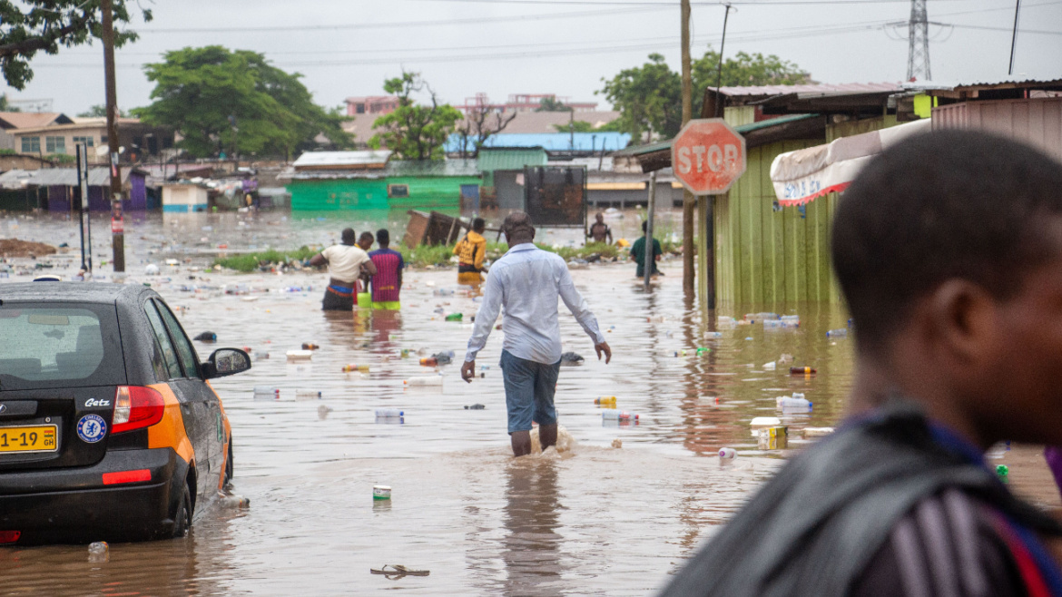 Residents contend with the flooding after a downpour in Accra, Ghana in 2020.