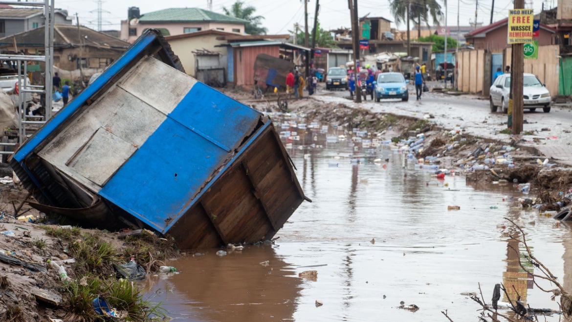An inclined wooden structure in a drain after flooding in Accra, Ghana in 2020.