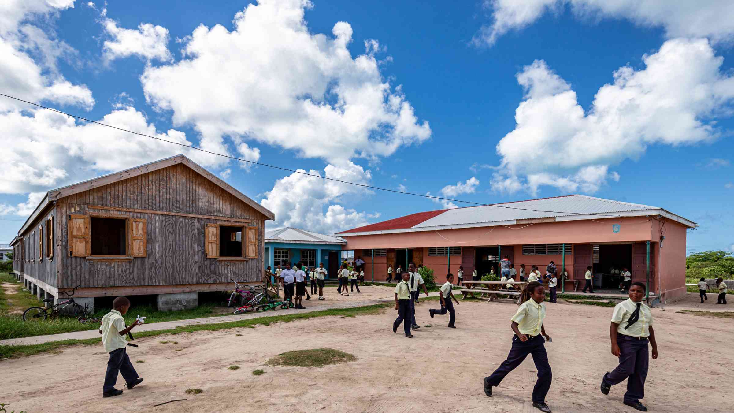 Children playing outside a resilient primary school in Barbuda