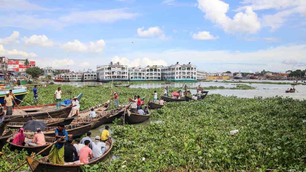 Dhaka, Bangladesh: The Buriganga river is always busy with wooden boats and passenger ferries.