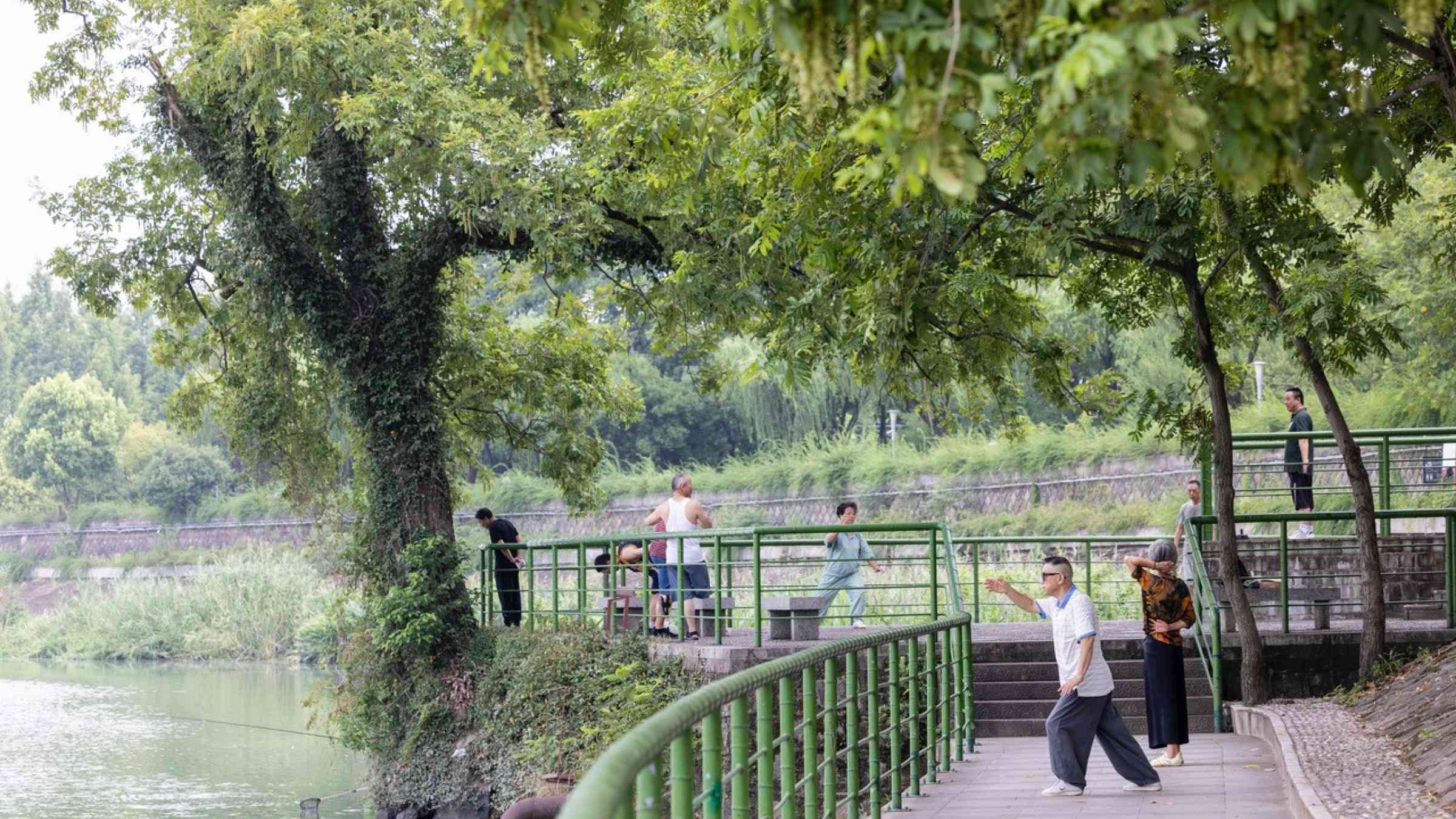 Residents exercise in Zhuji park, in China