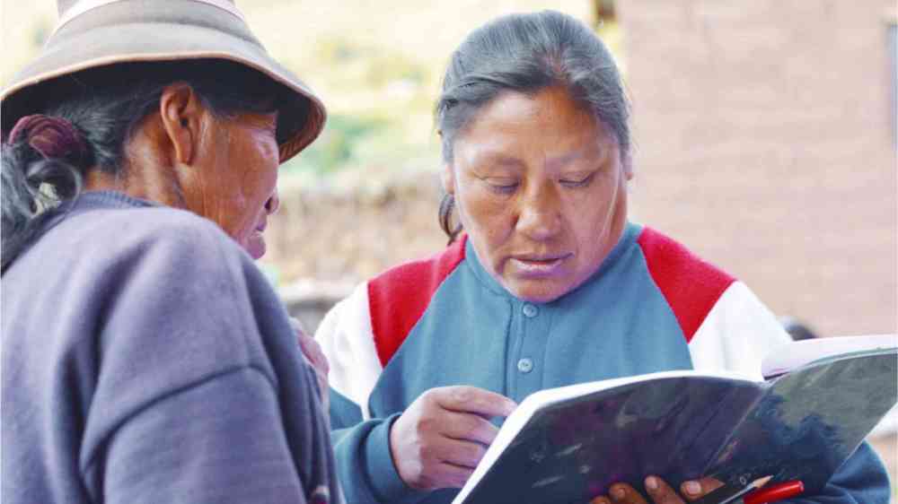 Indigenous women reading