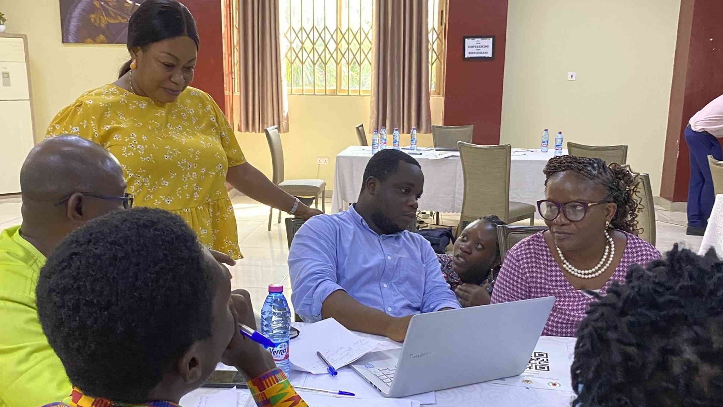 Photo of participants at the Ghana workshop while doing an activity