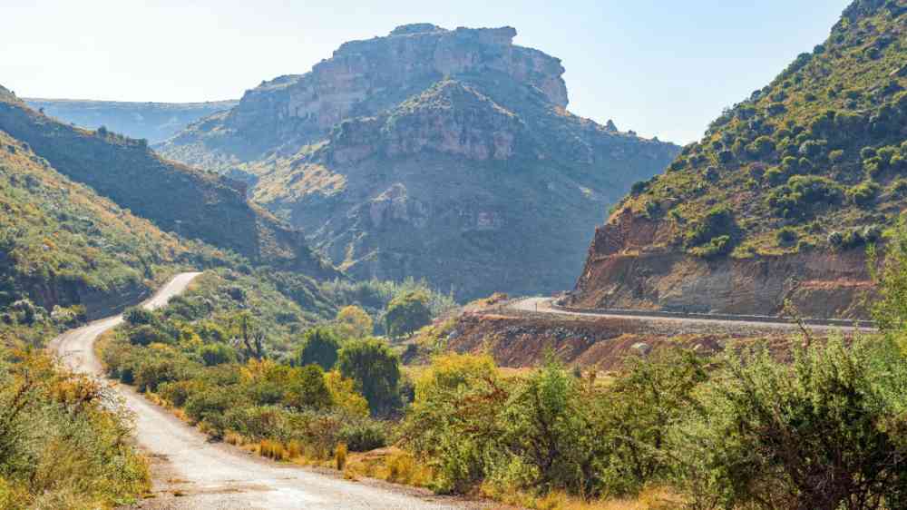 Early morning view of road S1354 in South Africa and road B16 in Lesotho on the right.