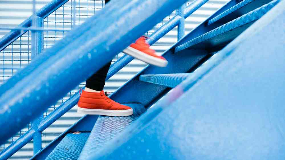 person climbing steps