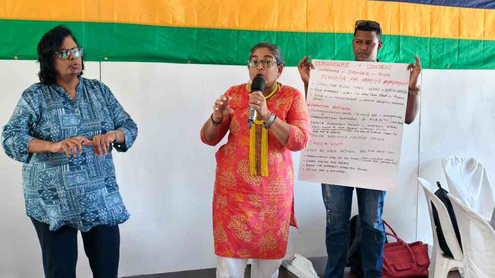 Participants present group work on accessible disaster risk awareness during a gender and disability-inclusive DRR exercise in Beau Bassin–Rose Hill, Mauritius, April 2026