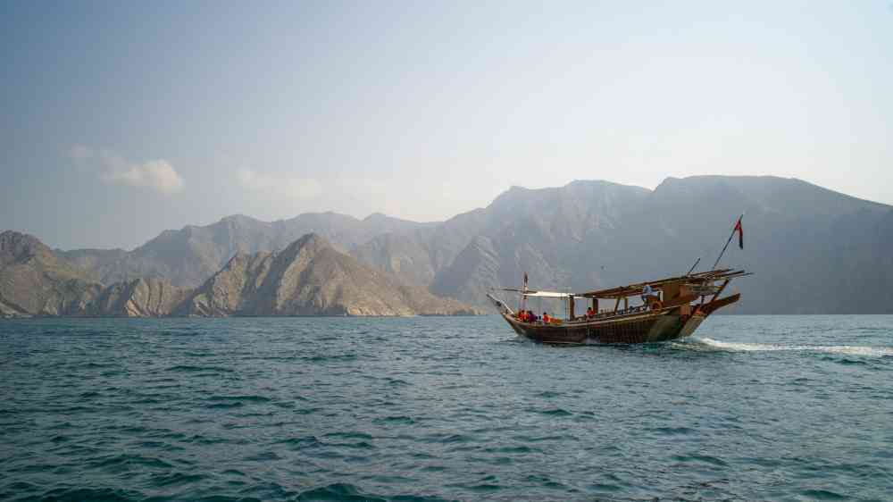 Picture of boat in the middle of a body of water