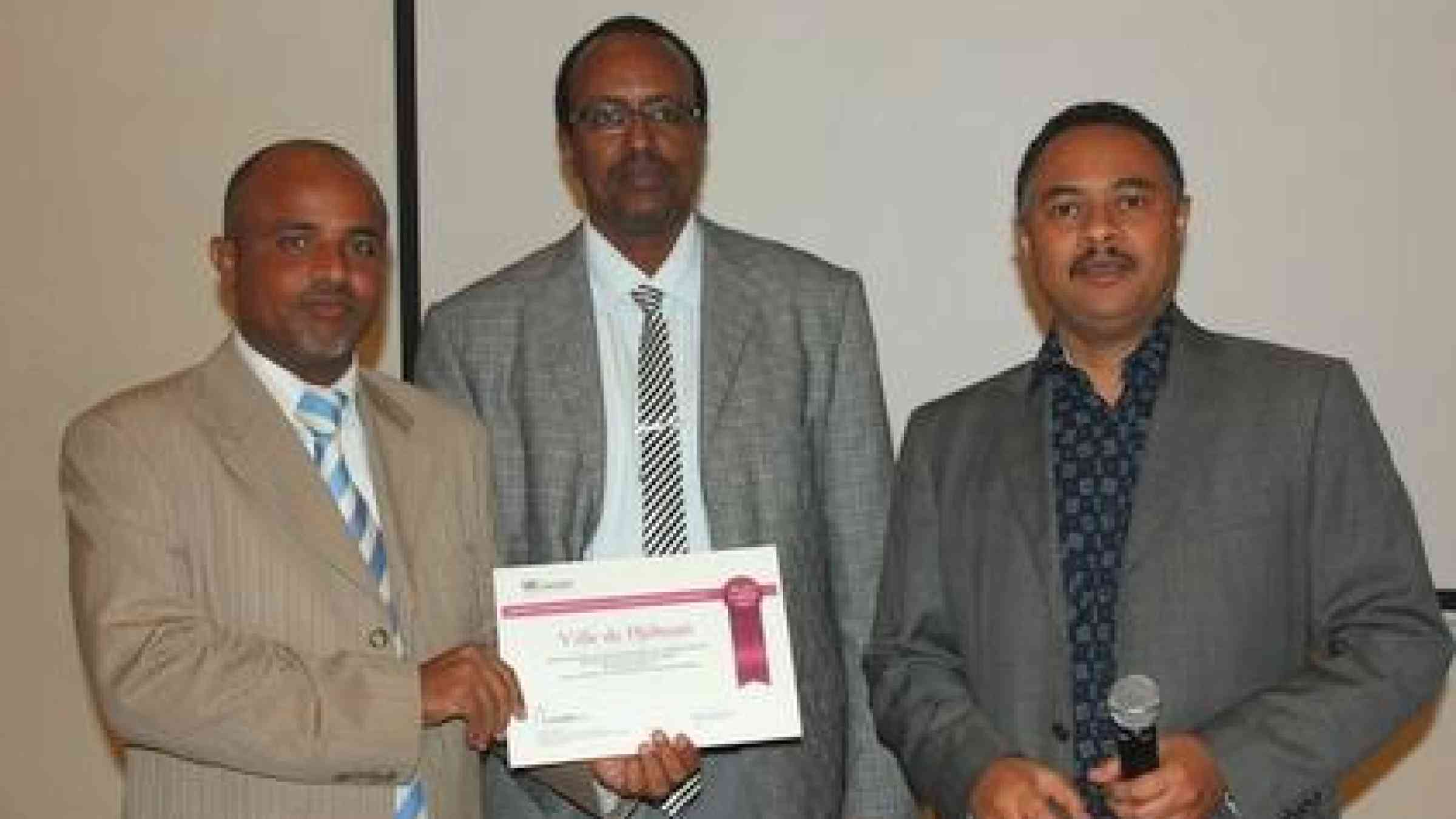 From left: Mayor of Balbala Ali Dato, who received the Making Cities Resilient campaign certificate on behalf of the Mayor of Djibouti Abdourahman Mohamed Guelleh, HFA National Focal Point Ahmed Mohamed Madar, and Head of UNISDR's Regional Office in the Arab States Amjad Abbashar.