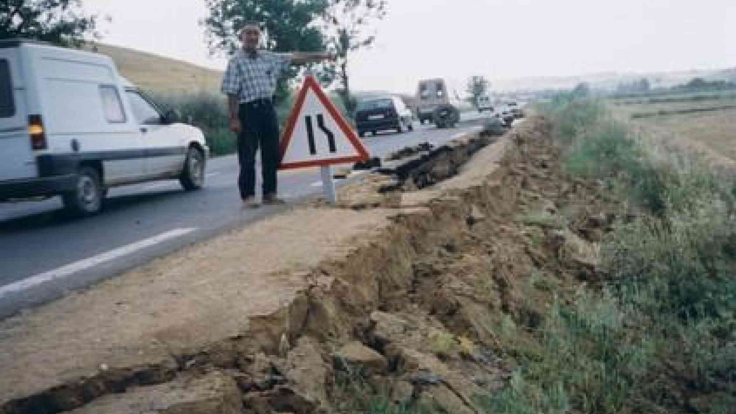 Slumps and cracks in a road near Algiers following a destructive earthquake of 6.8 magnitude that hit the region of Boumerdes and Algiers on May 21, 2003. Since then, Algeria passed Law 04-20 making disaster risk management a national priority as outlined in the HFA.