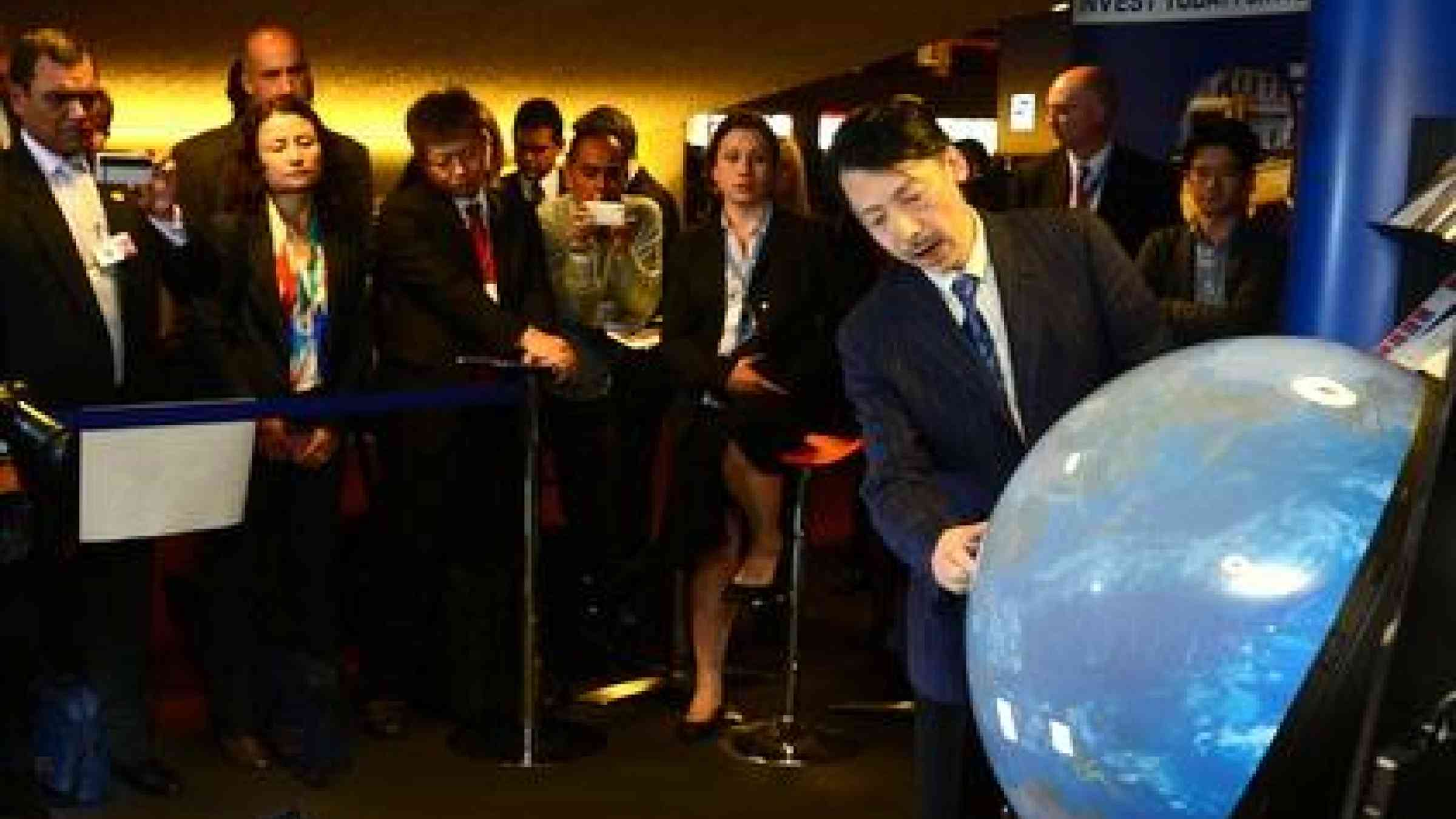 Professor Shinichi Takemura demonstrating the Tangible Earth