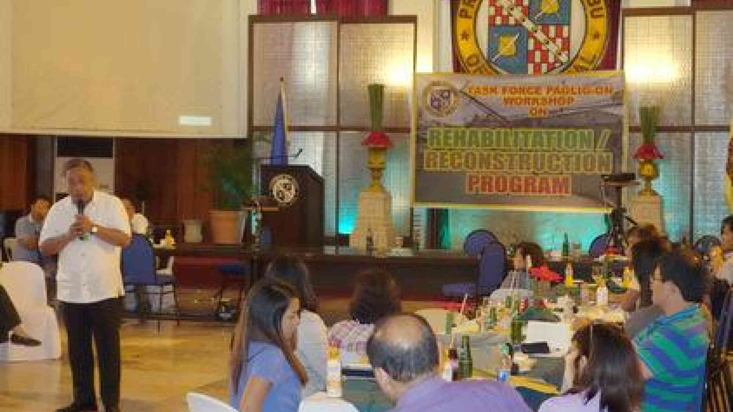 The Governor of Cebu Province, Hilario Davide III, addresses today's gathering in the Capitol's Social Hall Building, to come up with a rehabilitation plan for the typhoon shattered province.