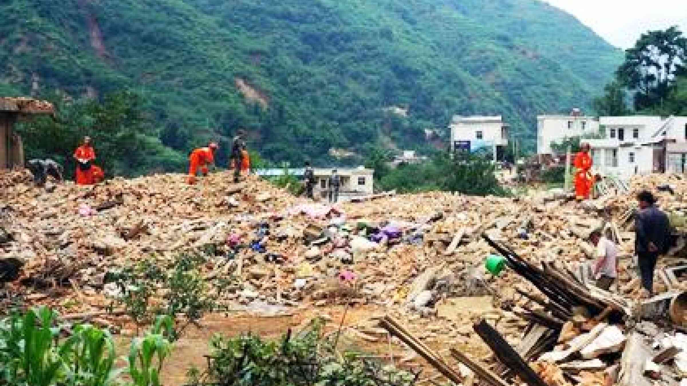Search and rescue teams sift through rubble in Ludian County, which was at the epicentre of Sunday's earthquake. (Photo: China's Ministry of Civil Affairs)
