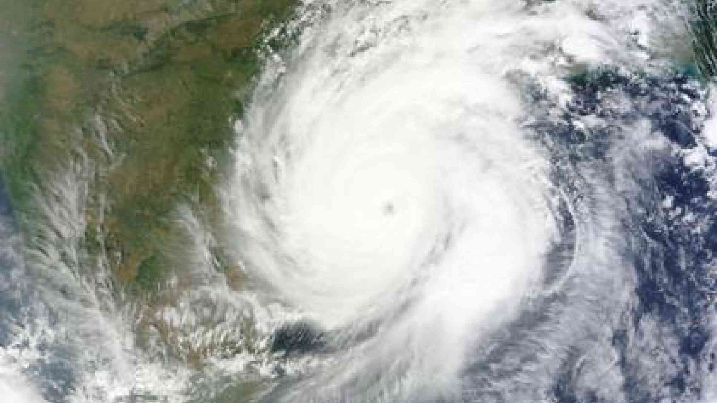 Cyclone Hudhud moving inland over the Indian east coast.
