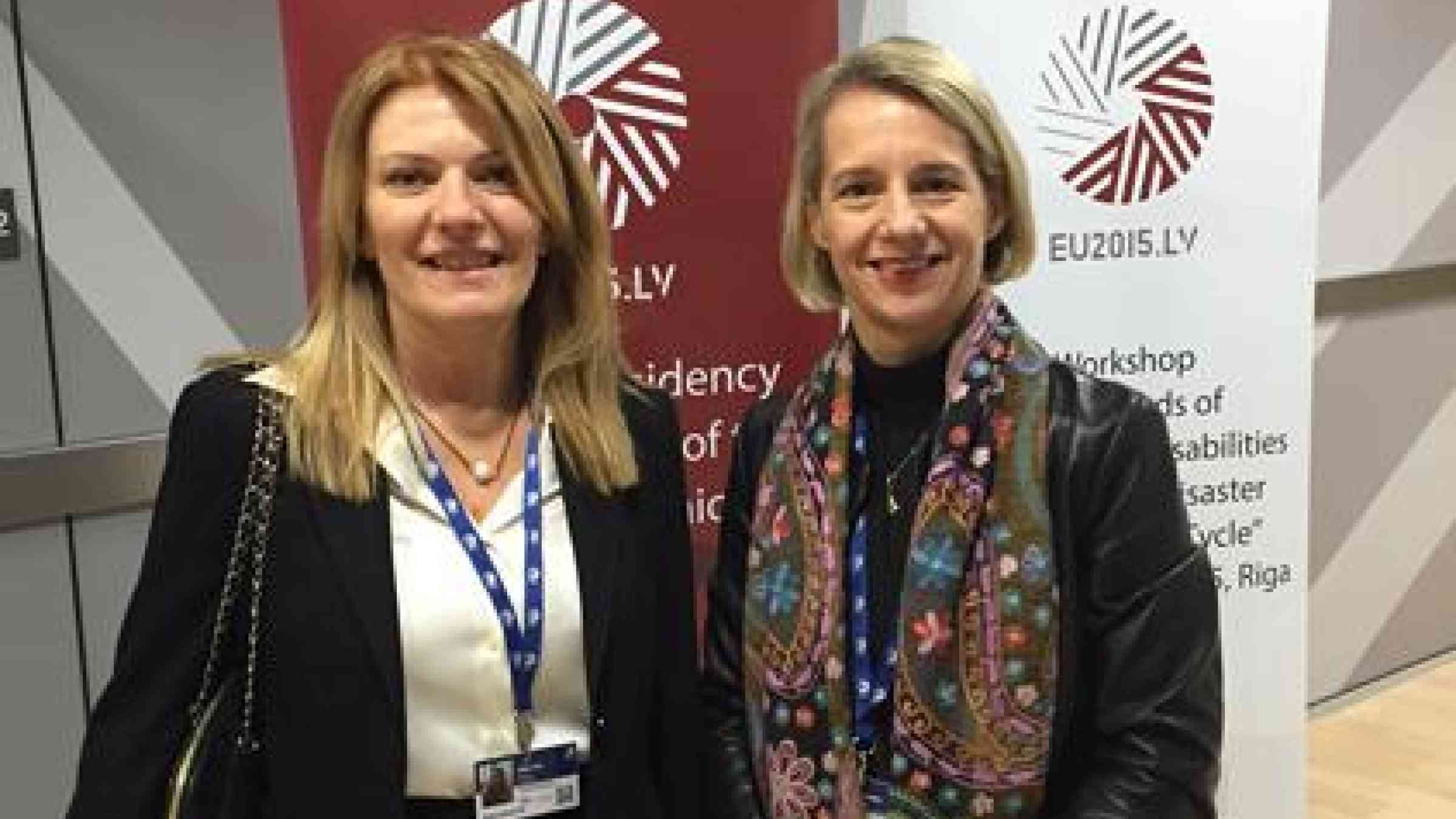 (From left to right): UNISDR's head of office for Europe, Paola Albrito, and Helga Stevens, a Belgian Member of the European Parliament, at a meeting in Latvia this week on DRR and persons with disabilities. (Photo: UNISDR)