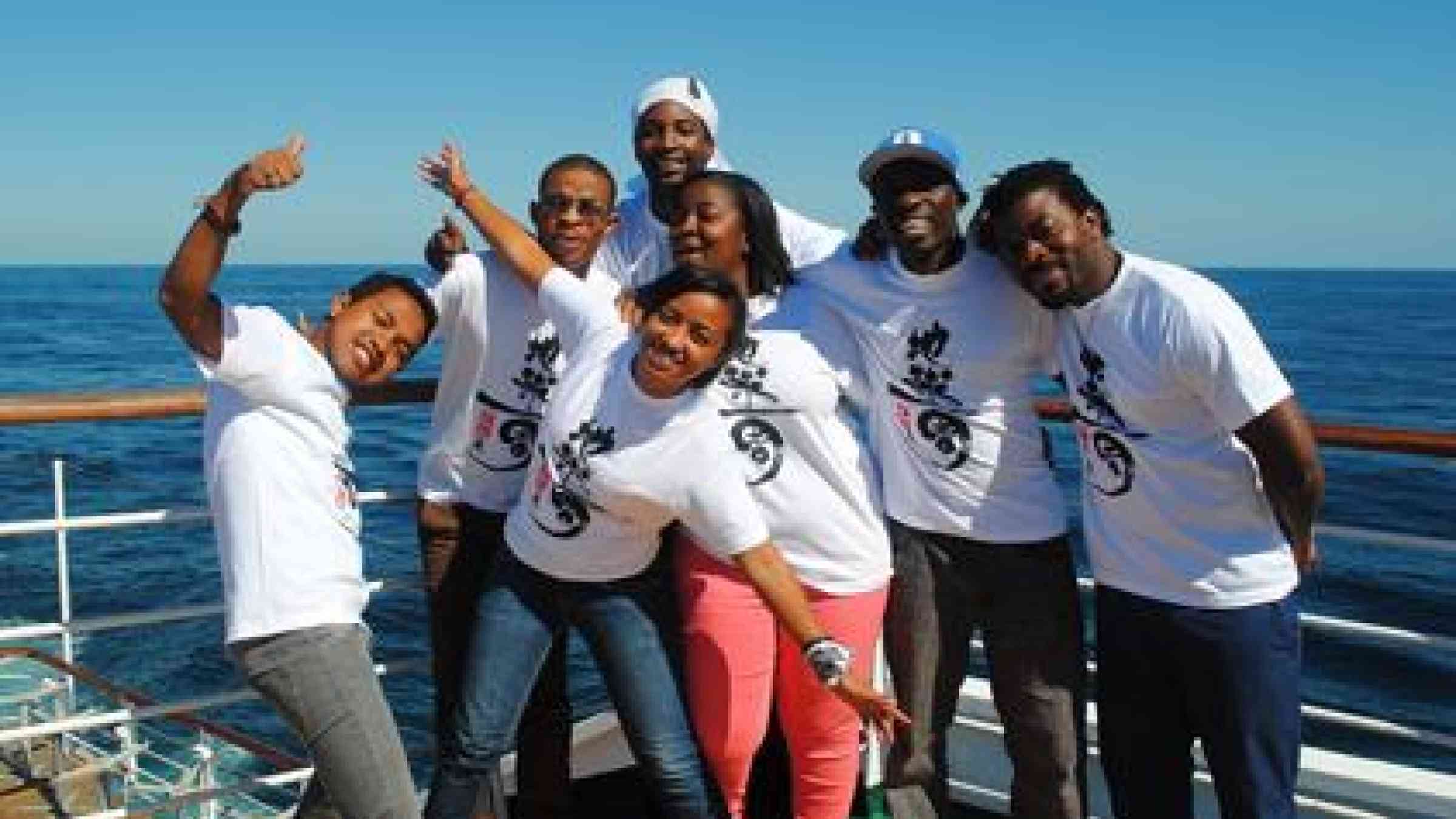 The seven African youth leaders enjoy a break after leading their disaster risk reduction sessions on board the Peace Boat.