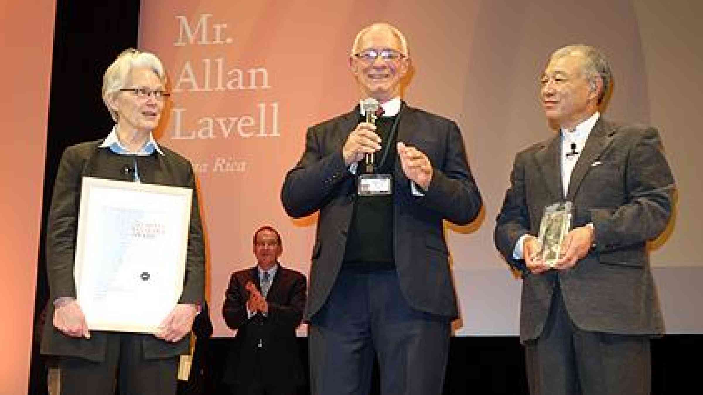 The Sasakawa winner Allan Lavall  is pictured here on stage with the head of UNISDR, Margareta Wahlstrom, and Yohei Sasakawa,chairman, the Nippon Foundation. (Photo: UNISDR)
