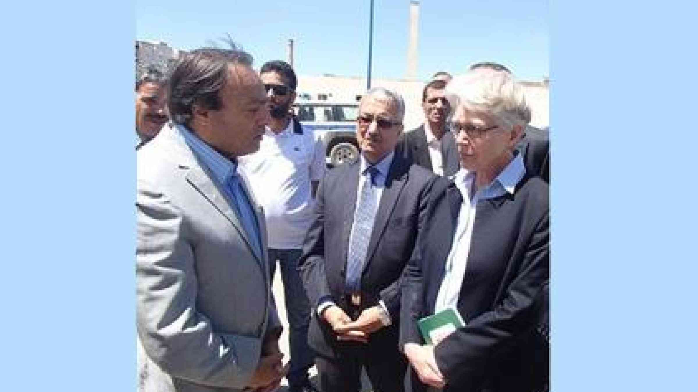 Ms. Margareta Wahlström, head of UNISDR (right), and Mr. Tahar Melizi, Algeria's National Delegate for Major Risks (centre), listen as a local official (left) in the Algerian city of Boumerdès details the community's recovery from the 2003 earthquake (Photo: UNISDR)