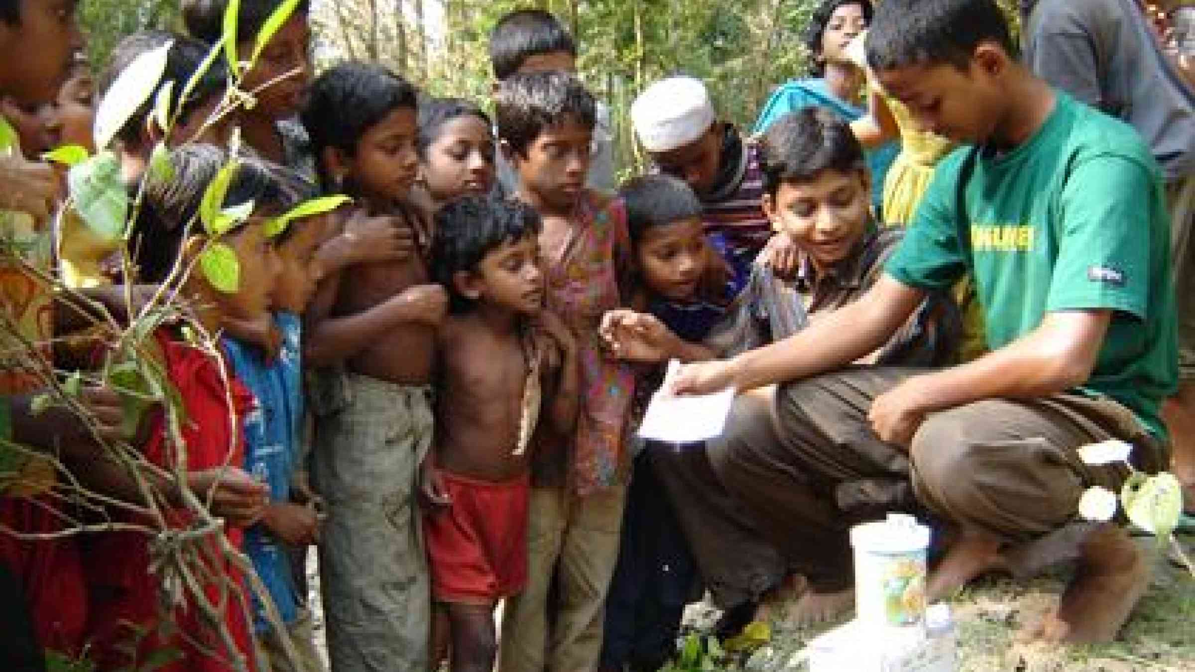 Children in East Sujonkathi in Bangladesh are given the gift of local knowledge about the environment and how to protect it. The community has been nominated as a champion of disaster risk reduction. (Photo: UNISDR)