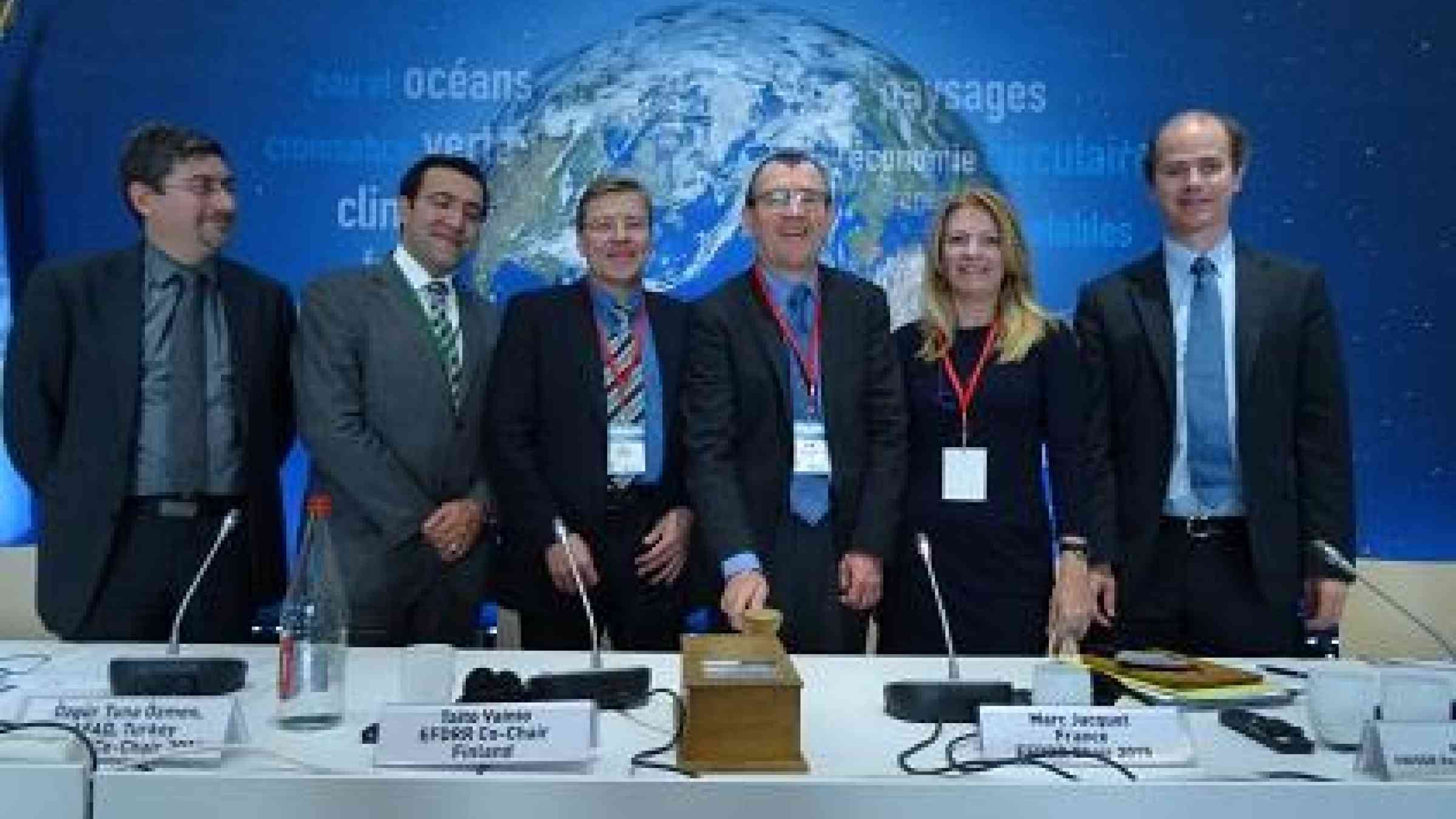 Gavel down on the EFDRR's Sendai Framework roadmap. From left: Fransesc Pla, Council of Europe; Özgür Tuna Özmen of EFDRR 2016 co-chair Turkey; Taito Vainio, of EFDRR 2016 chair Finland; Marc Jacquet, of EFDRR 2016 chair France; Paola Albrito, UNISDR; Thomas de Lannoy, European Commission (Photo: UNISDR)
