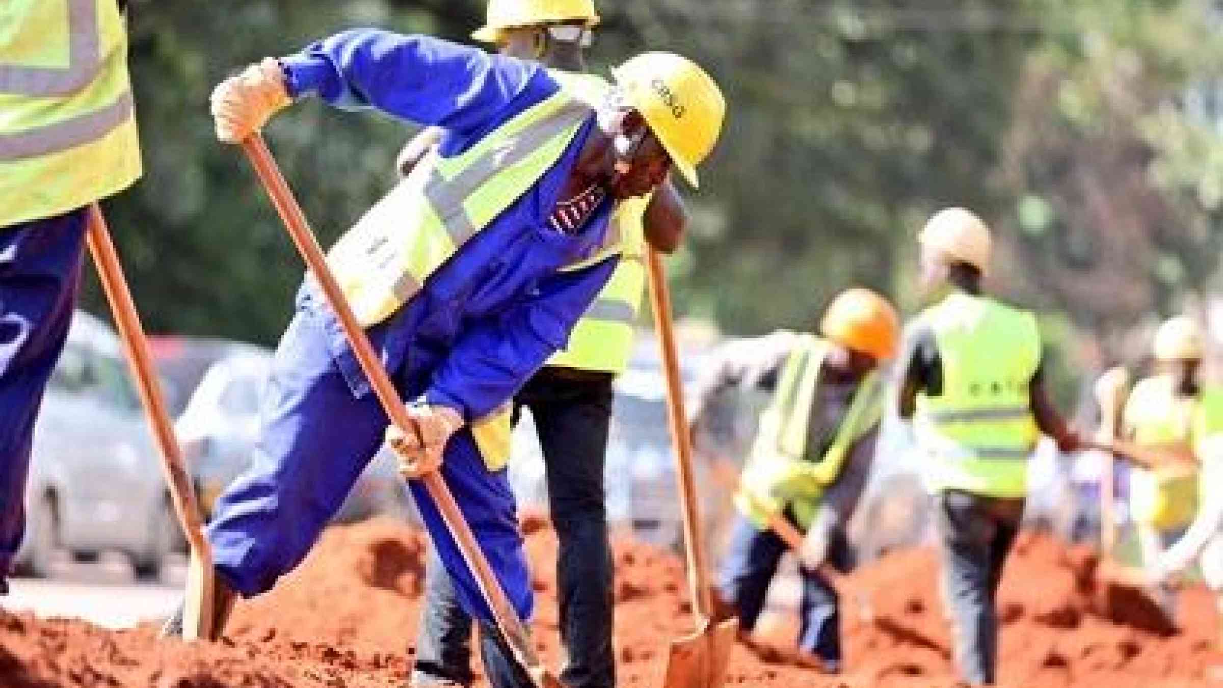 Working to reduce flood risks, KCCA employees excavate land to install storm drains along Kira Road in Kampala (Photo: KCCA)