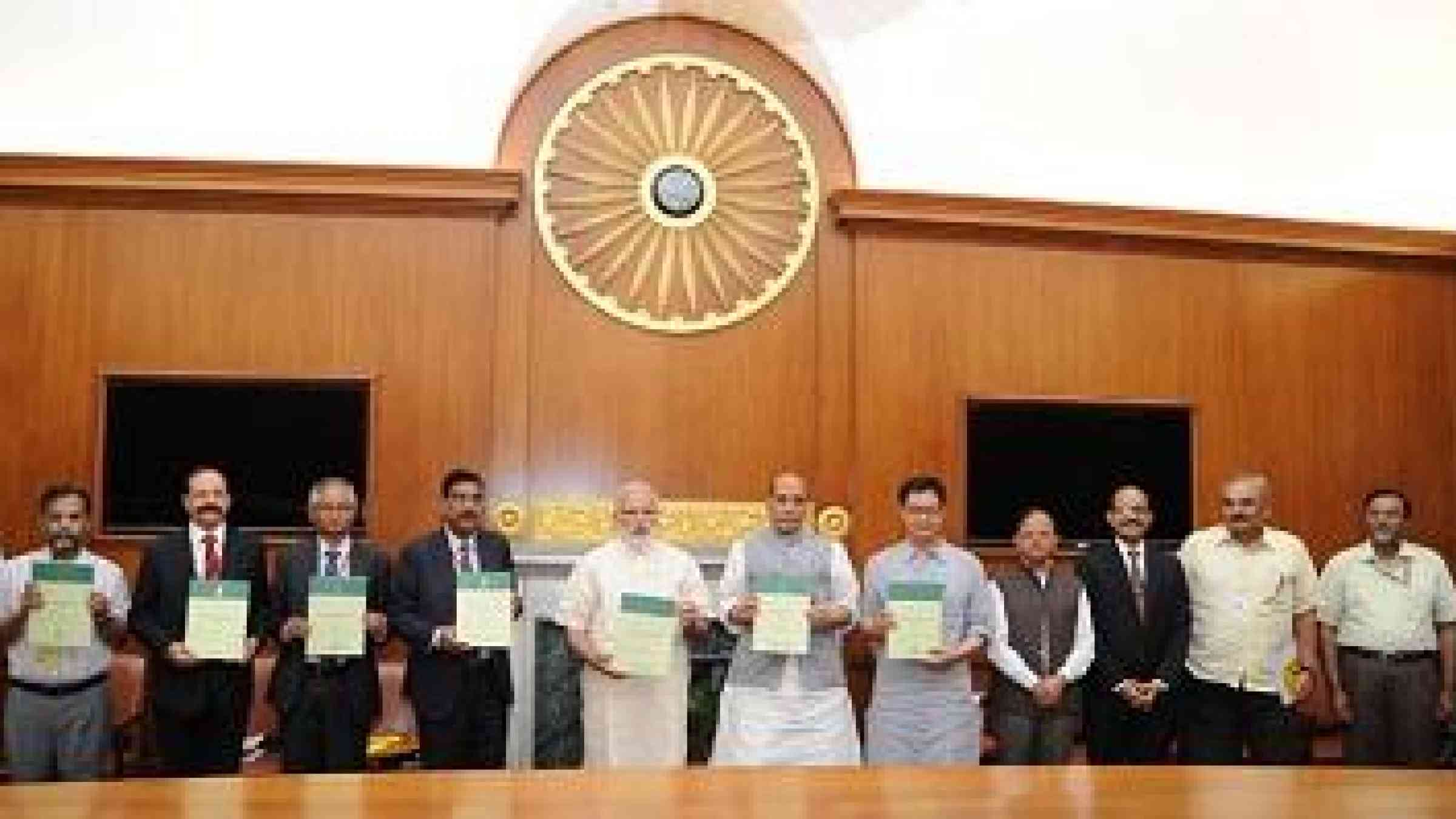 The Prime Minister of India, Mr. Narendra Modi (sixth from left) and members of his government hold copies of the country's first ever National Disaster Management Plan (Photo: Prime Minister's Office)