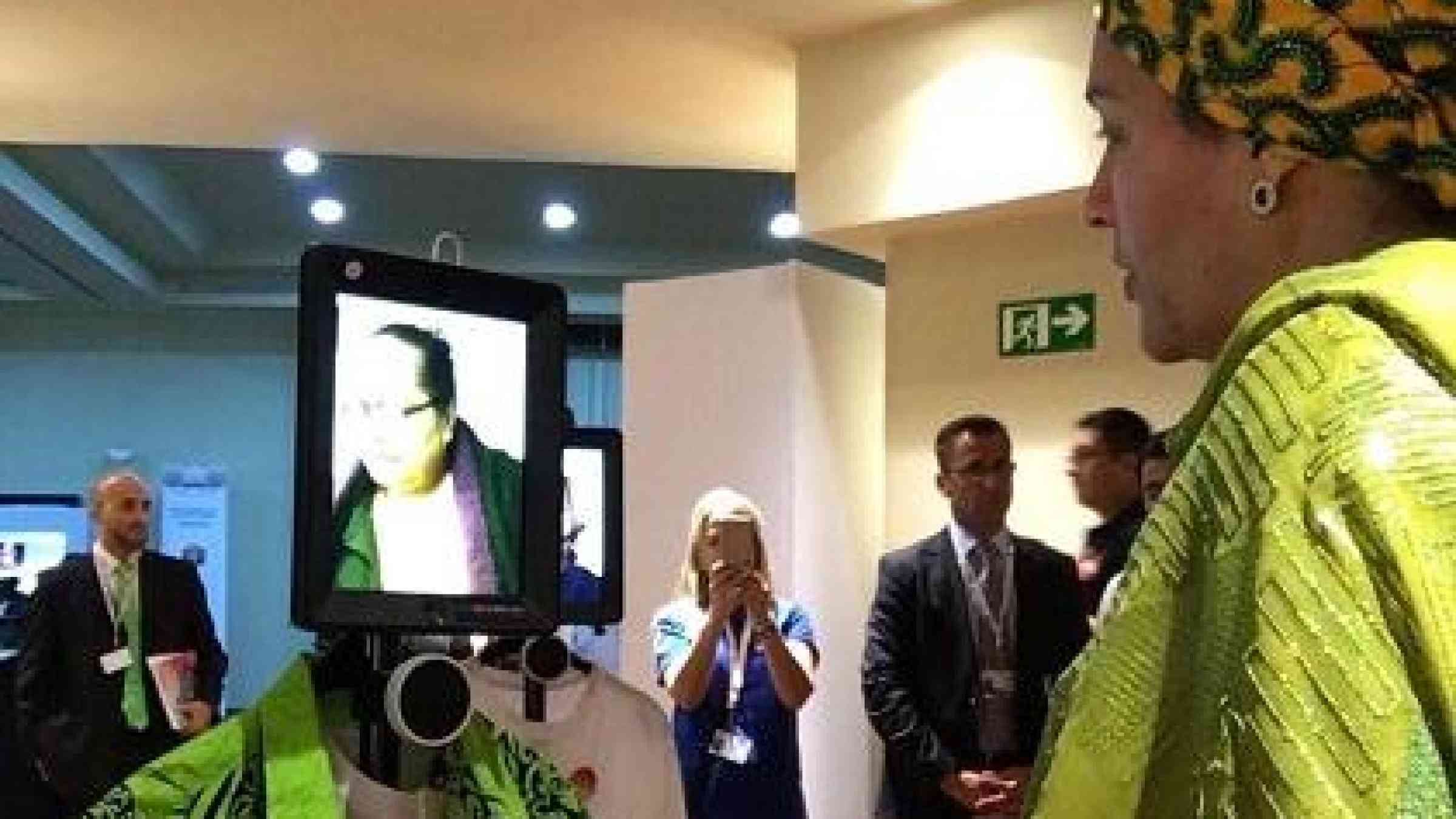 UN Deputy Secretary-General Amina Mohammed interacts with Lanieta Tuimabu, a board member of the Pacific Disability Forum, thousands of kilometres away thanks to the telepresence robot. (Photo: Catherine Naughton)