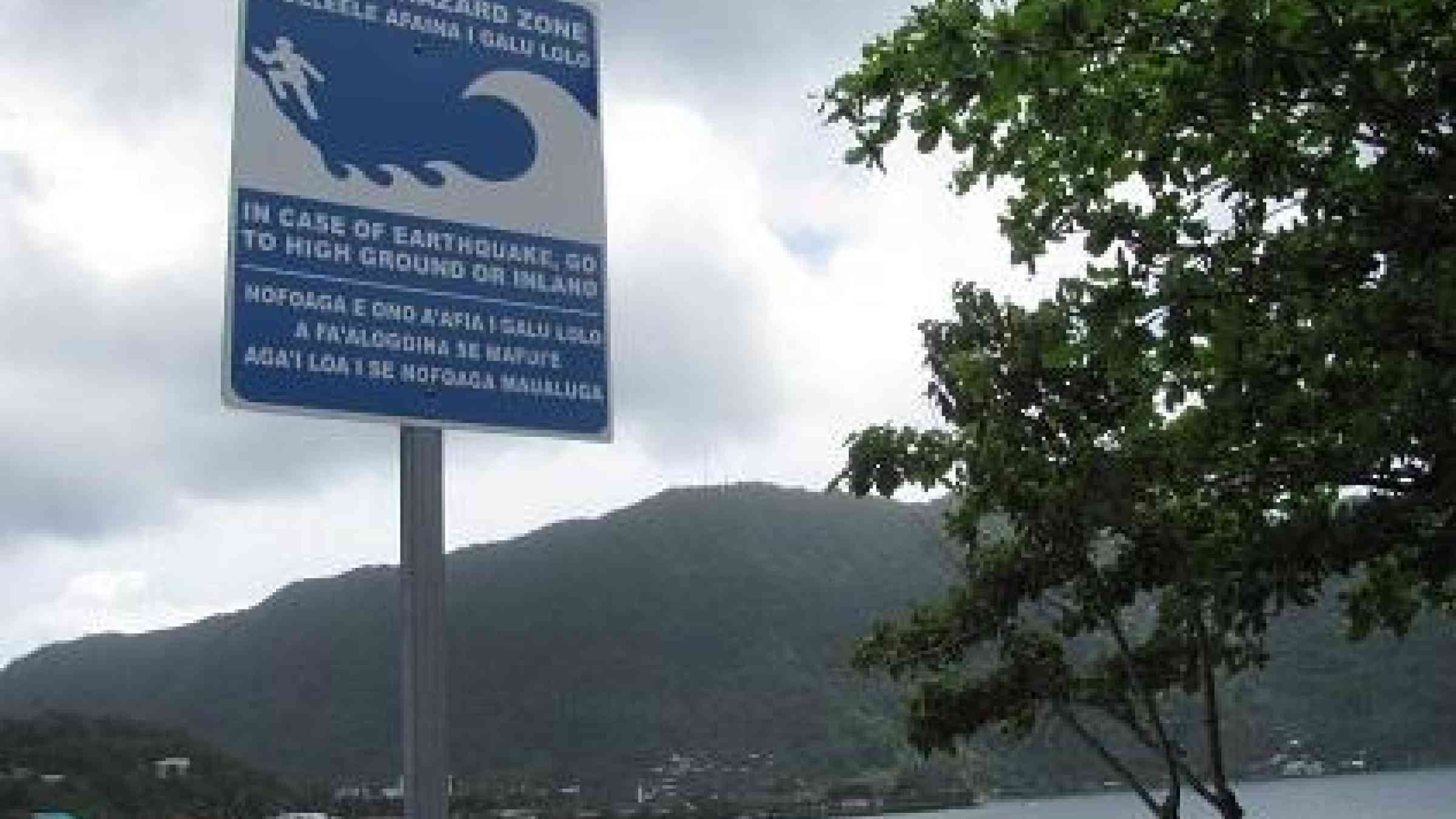 Tsunami warning signs, such as this one posted in American Samoa, are a key tool to raise public awareness of how to react (Photo: FEMA)