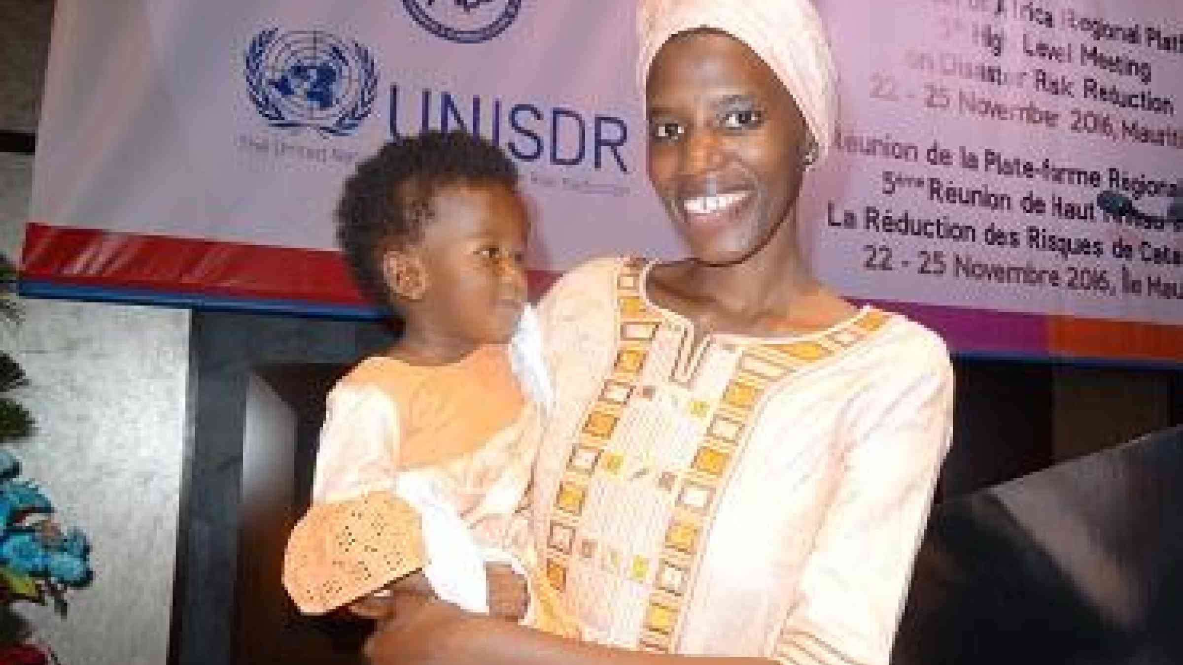 Faces of Resilience: Chilal and her mother, Ms. Oumie Sissokho, Director of Operations, Gambia National Disaster Management Agency, at the last Africa Regional Platform for Disaster Risk Reduction