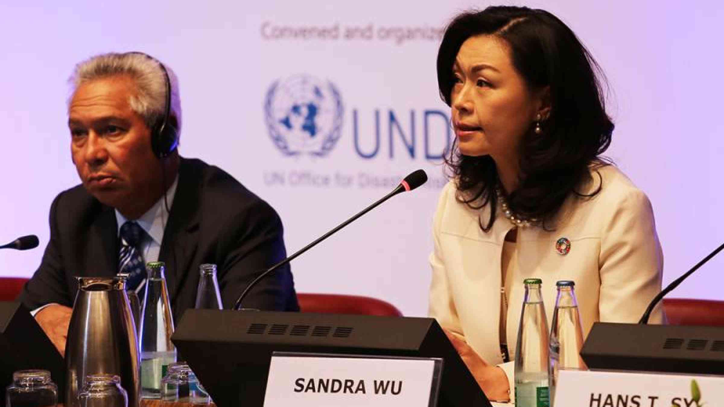 Panelists at the High-Level Dialogue on risk-informed public and private investment: Isidoro Santana, Minister of Economy, Planning and Development, Dominican Republic and Sandra Wu, UN Global Compact