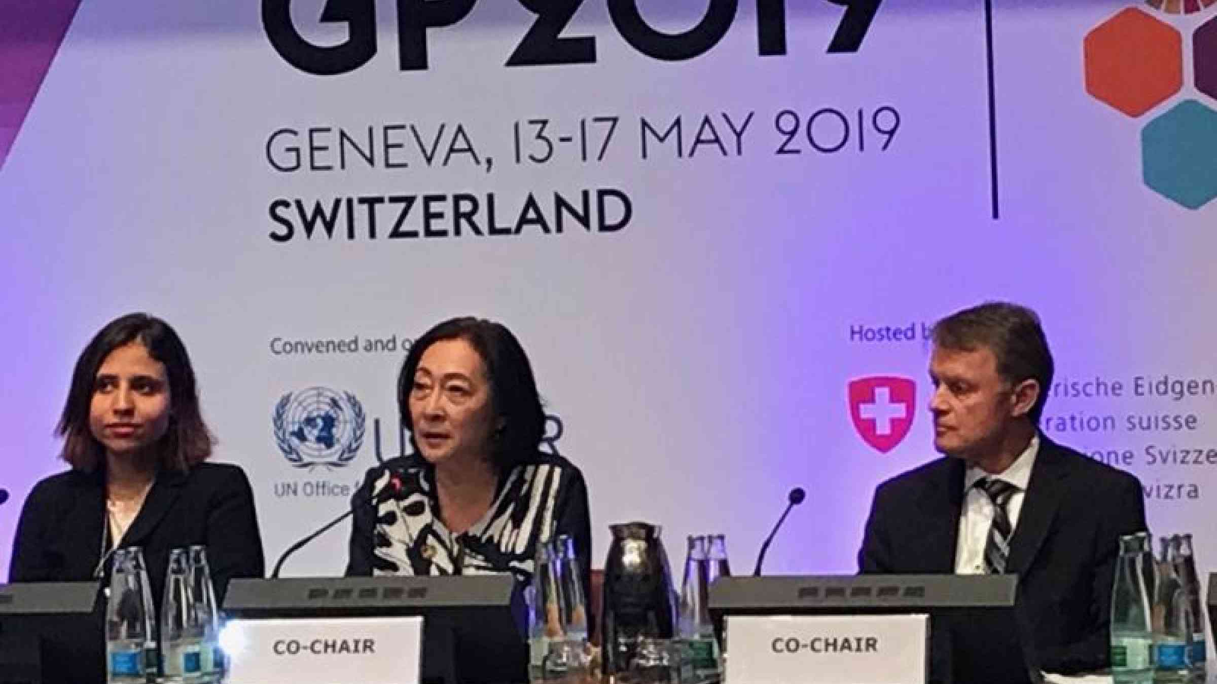 At the closing ceremony of the Global Platform, Marwa Elmenshawy, Stakeholder Engagement Mechanism, and Global Platform co-chairs, Mami Mizutori, UNDRR, and Manuel Sager, Secretary of State, Switzerland.