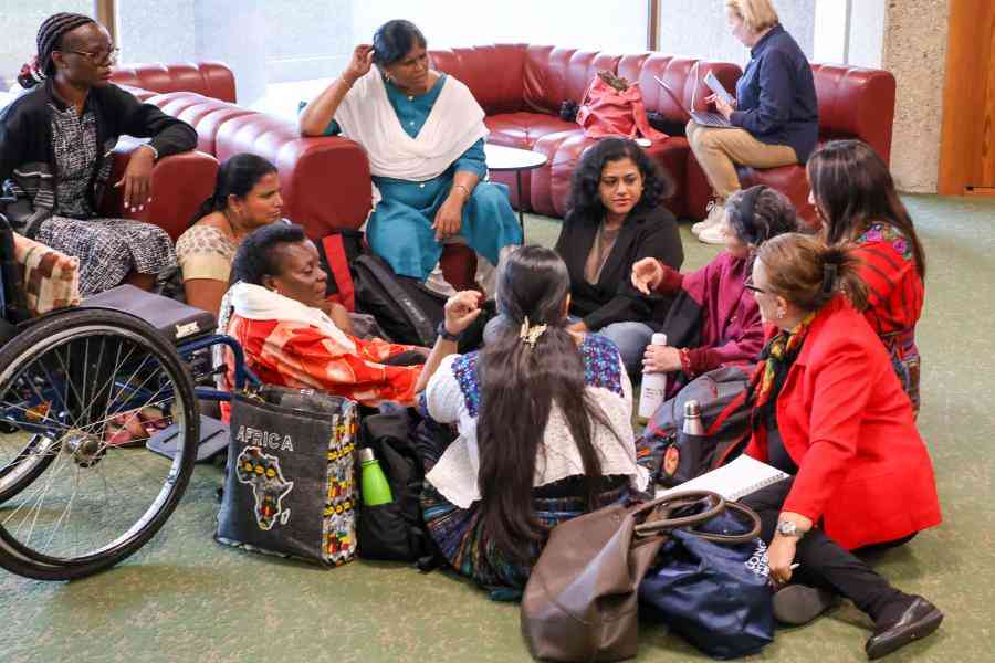 Participants engaging in discussions between sessions at GPDRR