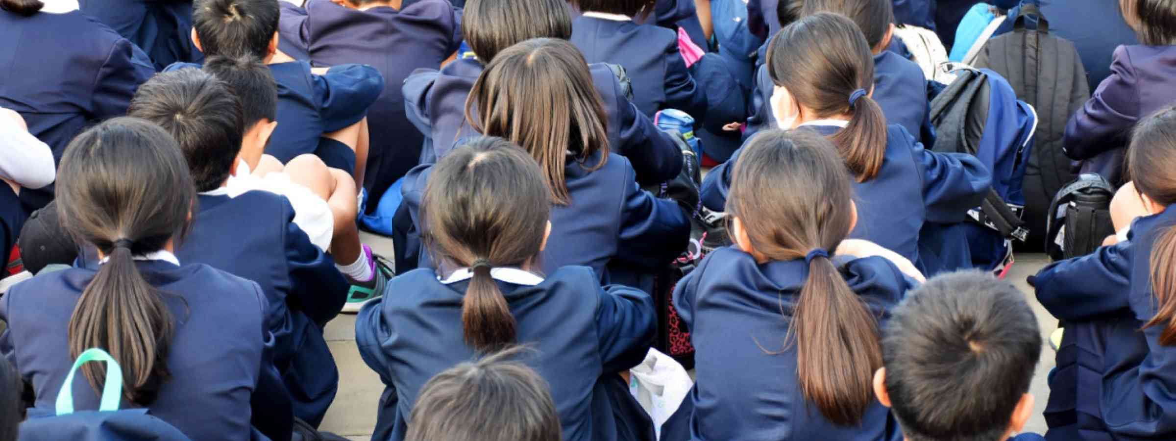 Japan school students Crowd of Japanese highschool students wearing school uniforms
