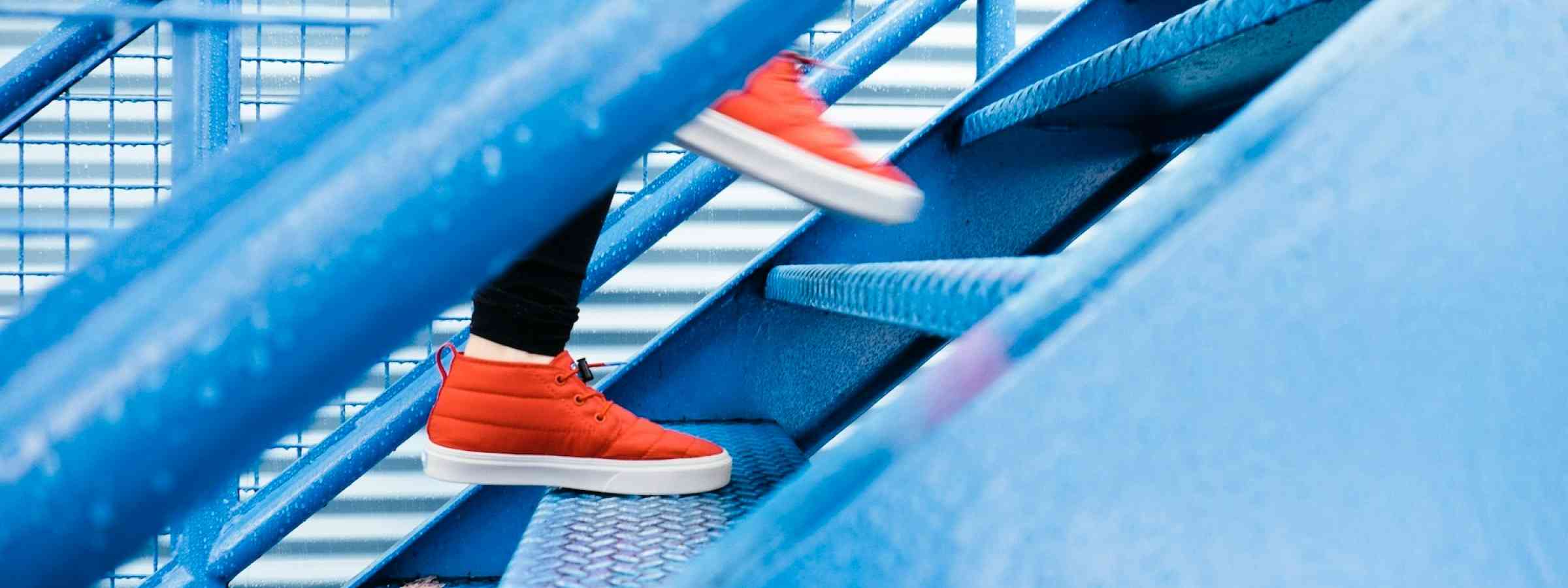 person climbing steps